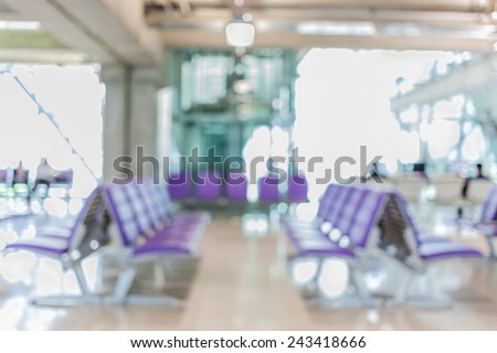 Blurred background of seat row around boarding gate in Airport.