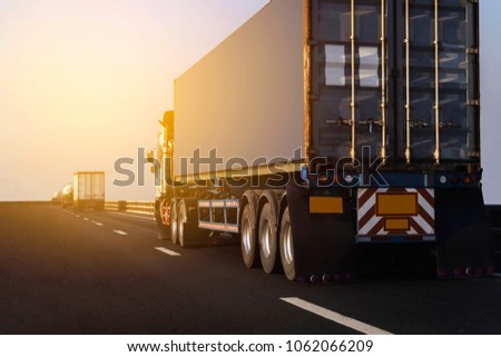 Truck on highway road with big container, transportation concept.,import,export logistic industrial Transporting Land transport on asphalt expressway