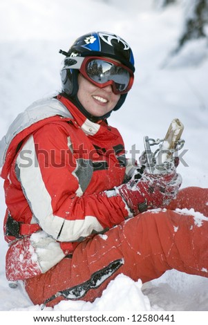 Beautiful girl snowboarder after incidence (series sport, mountains, extreme, horses, teenagers)