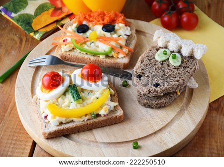 Funny sandwiches with faces for kids. Colorful and healthy breakfast!