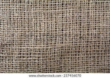 Macro shot of knitted linen bag: textile background