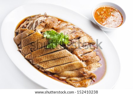 Duck five spices and sauce in dish on white background.
