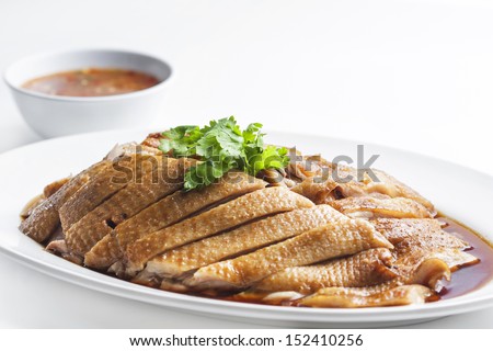 Duck five spices and sauce in dish on white background.