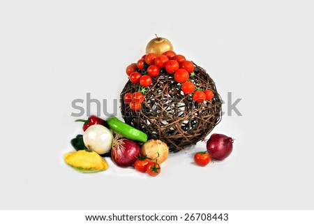 Sphere with vegetables-tomatoes and an onions, pepper and vegetable marrows