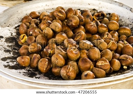 Plate filled by the roasted fresh chestnut