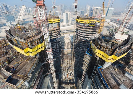 United Arab Emirates, Dubai, 05/21/2015, Damac Towers Dubai by Paramount, construction and building ariel views with cityscape background