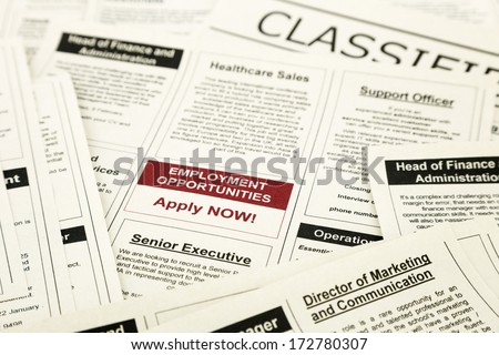 newspaper with advertisements and classifieds ads for vacancy, employment opportunities