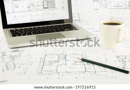 house blueprints and floor plan with laptop, architecture business concepts and ideas