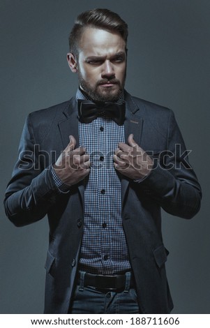 elegant man in a jacket and bow tie