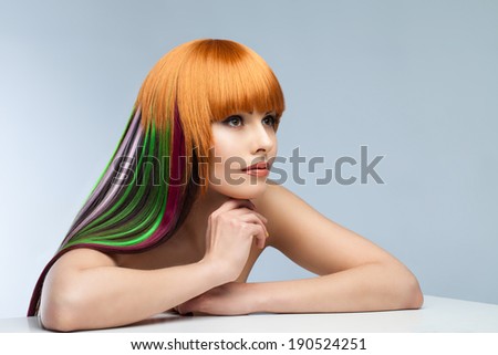 beautiful woman with creative colored hair