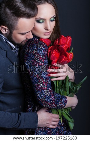 man and woman in a dark room, love or separation
