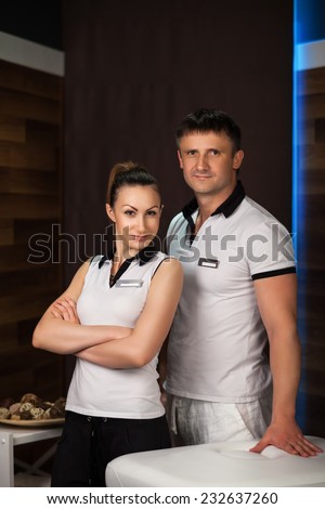 portrait of men and women in the spa cabinet, masseurs