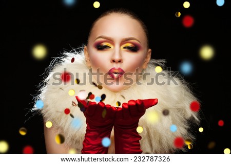 portrait of beautiful girl with bright makeup, red gloves on his hands