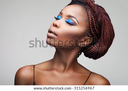 beautiful girl with African roots on a white background