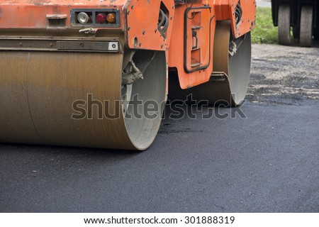 Road making with heavy machines,roller for mastic asphalt paving