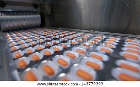 tablets coming out of the machine