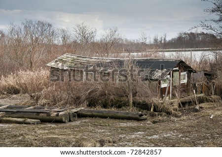 Old house on river bank