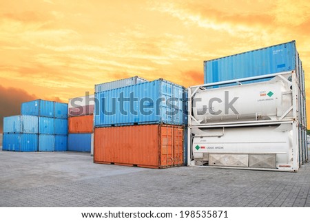 Stack of Cargo Containers and liquid  tank at the docks