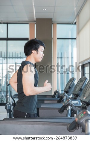 man at the gym doing exercise on the treadmill