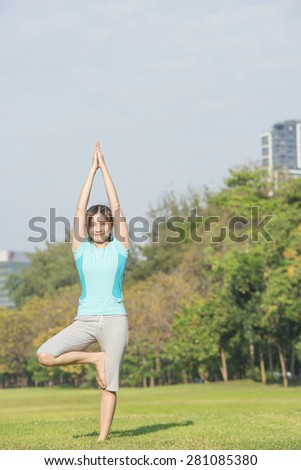 Asian woman make yoga call \