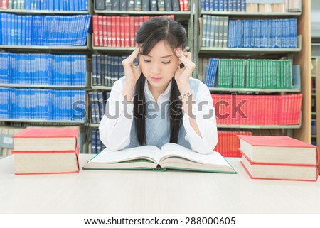 Young asian student under mental pressure