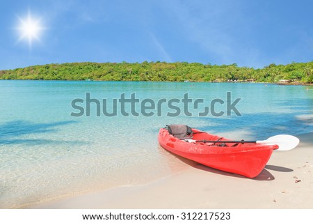 Summer, Travel, Vacation and Holiday concept - Red kayaks on the tropical beach, Thailand