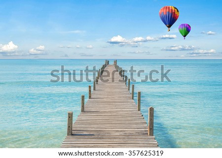 Summer, Travel, Vacation and Holiday concept - Wooden pier in Phuket, Thailand