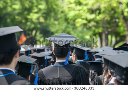 back of graduates during commencement at university