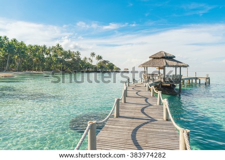 Summer, Travel, Vacation and Holiday in Phuket, Thailand concept - Wooden pier in Phuket, Thailand. Phuket is one of the southern provinces of Thailand.