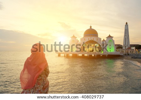 Malacca Straits Mosque with Muslim pray in Malaysia.