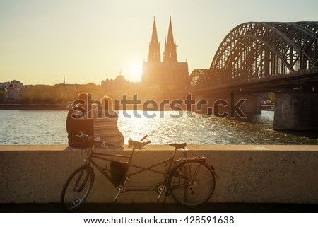 Young romantic couple spending their vacation in Cologne, Germany.