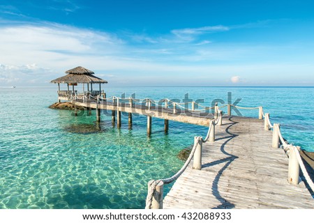 Summer, Travel, Vacation and Holiday concept - Wooden pier in Phuket, Thailand. Phuket, Thailand travel, Phuket is province in Thailand.