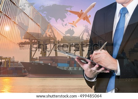Double exposure of businessman is booking with blurred cargo , transportation port and world map. Transportation logistic business concept. Elements of this image furnished by NASA