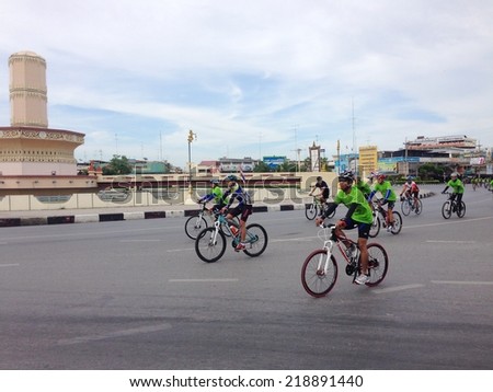 LOP BURI, THAILAND-SEPTEMBER 21: Group of cyclists Participated in the activity Car Free Day campaign on September 21, 2014 in Lop Buri,Thailand.