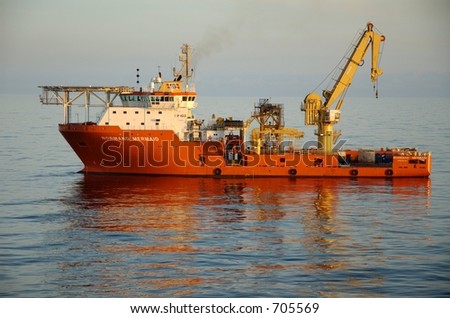Supply and emergency boat for offshore oil rigs