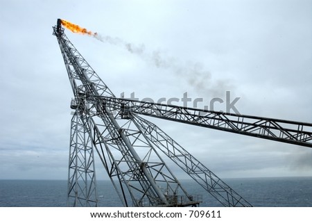 The leaning offshore oil rig flare boom