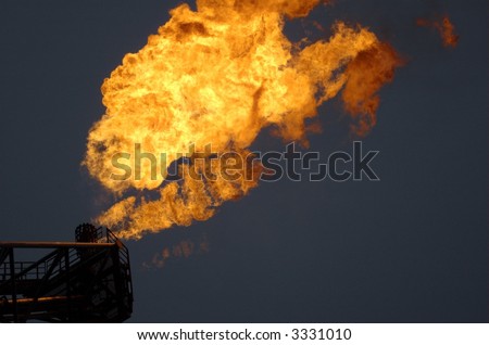 Burning flare tower on offshore oil rig