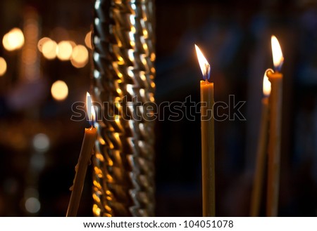 Candle at the church background
