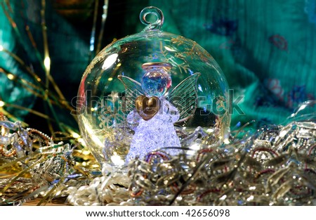 christmas glass ball with bright angel