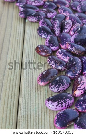 bright purple beans scattered on the table