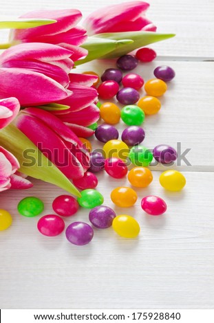 spring bouquet with tulips and colored candies