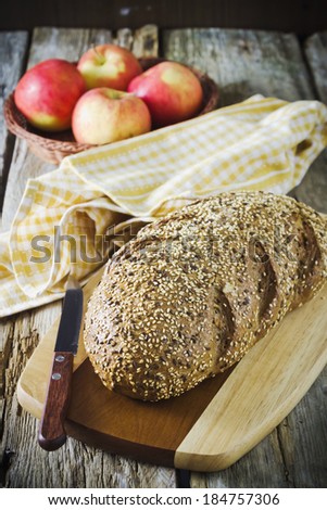 fresh bread and apples on the table