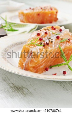 salmon fillet on a plate on the table close-up. selective focus. health and diet food