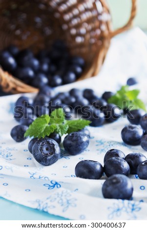 fresh blueberries scattered on the table. gifts of summer.selective focus
