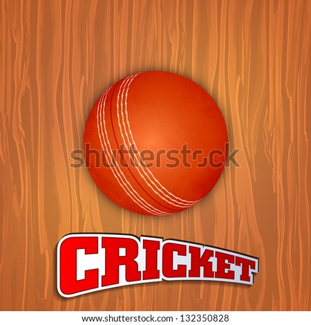 Sports concept with shiny red ball and text cricket on wooden background.