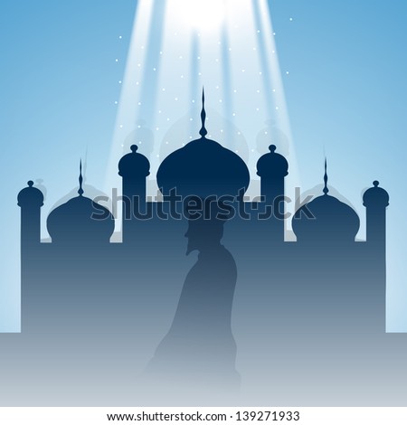 Silhouette of Muslim Man reading Namaj (Islamic Prayer) with Mosque or Masjid, background for holy month Ramadan or Ramazan.