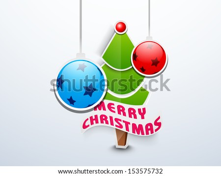 Merry Christmas celebration background with Xmas Tree and hanging decorated Xmas balls on blue background.