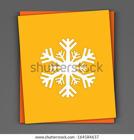 Merry Christmas celebrations concept with beautiful snowflake design on yellow paper.