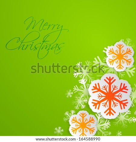 Merry Christmas celebration greeting card or invitation card with beautiful orange and pink snowflakes on green background.