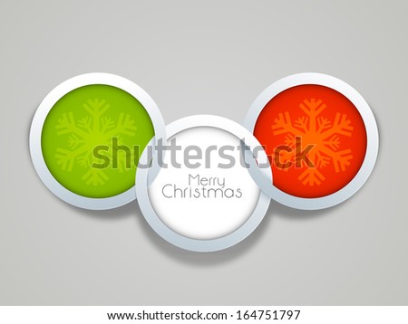 Creative Merry Christmas celebration sticker, tag or label in orange, white and green color decorated with snowflakes on grey background.